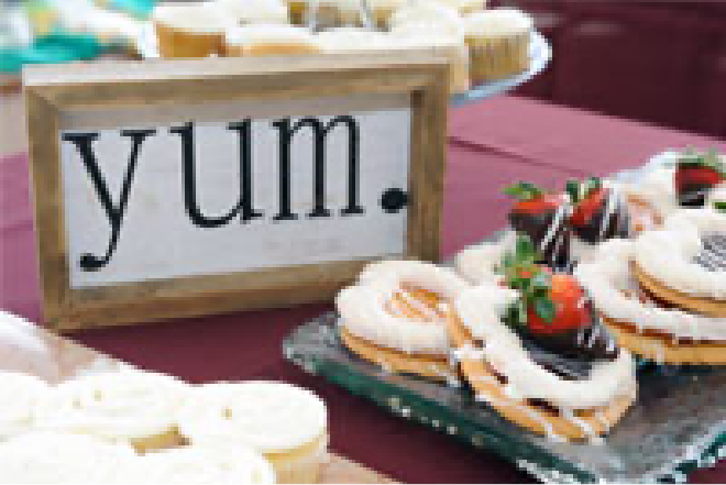 Pastries and a sign that says "Yum"